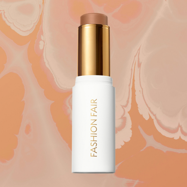 Fashioon Fair stick foundation on a marble beige background